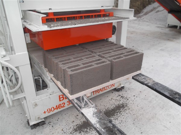 Concrete-Hollow-Blocks-Produced-By-Block-Machine.jpg
